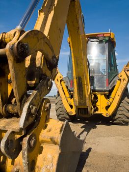 Heavy Duty construction equipment parked at work site 