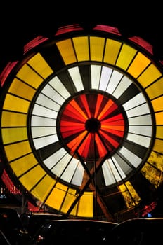 View of a spinning carnival ride at night in Temecula, California.