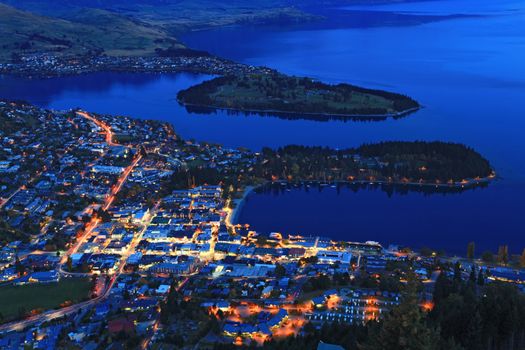 Cityscape of queenstown with lake Wakatipu from top at dusk.