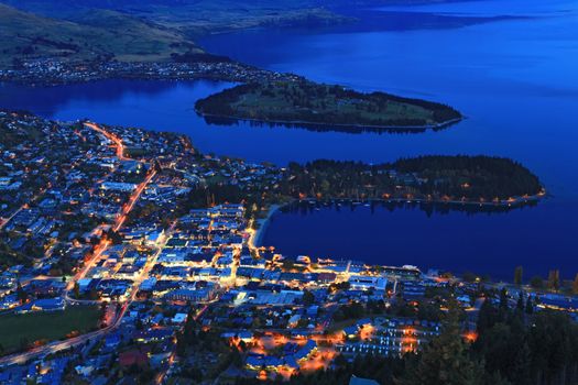 Cityscape of queenstown with lake Wakatipu from top at dusk.