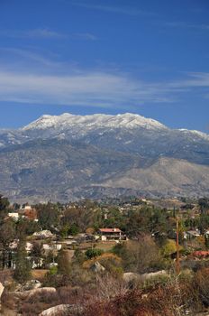 The snow-capped peak of Mount San Jacinto rises high above the town of Hemet, California.