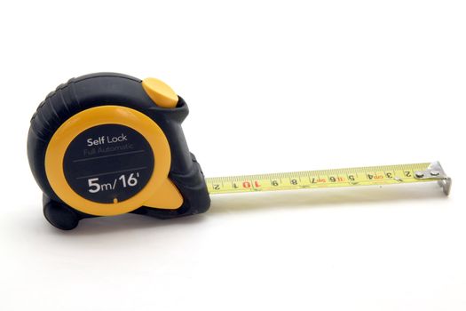 isolated yellow measuring tape on white