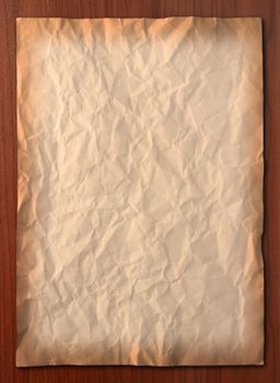 Wrinkled vintage paper on wooden board, Vertical