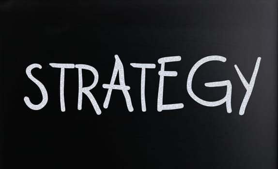 The word "Strategy" on a blackboard