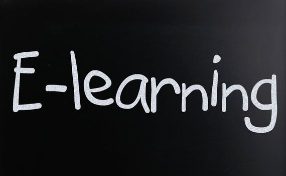 The word "E-learning" handwritten with white chalk on a blackboard