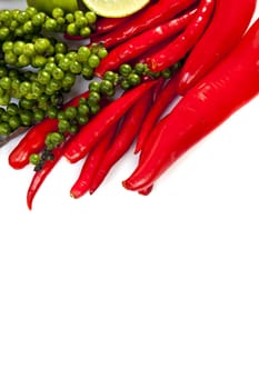 Mix food ingredient chili peppercone and lime on the white background with blank text message copy space