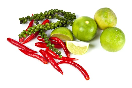 Mix food ingredient chili peppercone and lime on the white background
