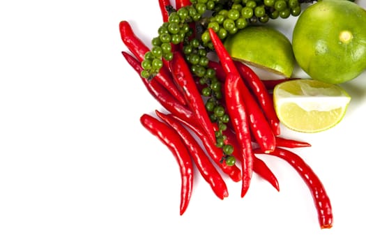 Mix food ingredient chili peppercone and lime on the white background with blank text message copy space