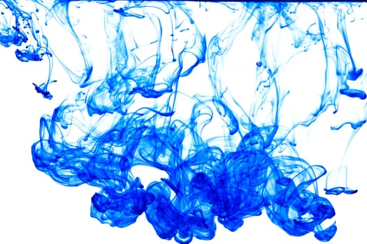 Blue ink isolated dissolving in water