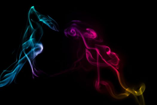 Multi color abstract smoke on black