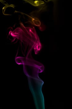 Multi color abstract smoke on black