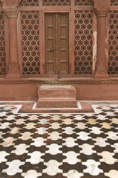 Taj Mahal. Detail of red sandstone doorway and patterned stone flooring. Agra, Uttar Pradesh. India