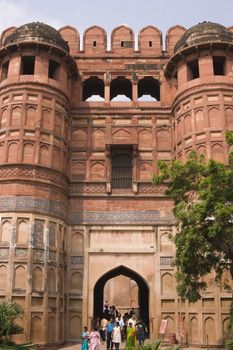 Tourists at the entrance to the Red Fort in Agra, Uttar Pradesh, India.