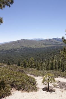 High angle of the Sierra Nevadas with blue sky and granite