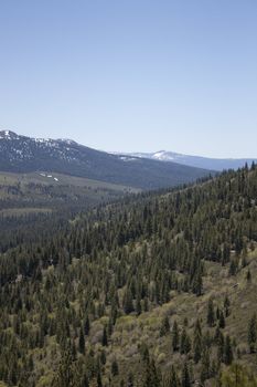 High angle of the Sierra Nevadas with blue sky and granite