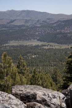 High angle of the Sierra Nevadas with blue sky and granite