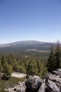 High angle of the Sierra Nevadas with blue sky and granite