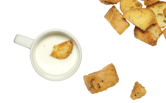 closeup of delicious bread croutons and milk