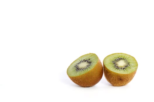 Set of cut kiwis isolated on white