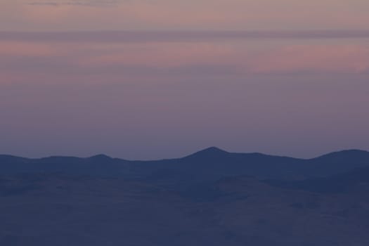 Mountain range and sky at dusk. excelletn for copyspace or backdrops.