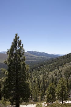 High angle of the Sierra Nevadas with blue sky and granite