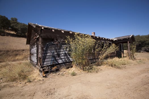 Old barn house with a blue clear sky