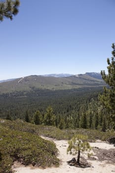 High angle of the Sierra Nevadas with blue sky and granite