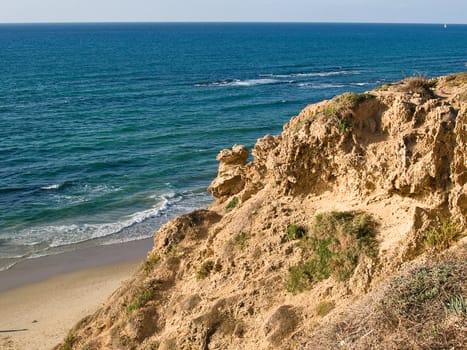 Beautiful Mediterranean coast landscape with clear blue sea and limestone rocks