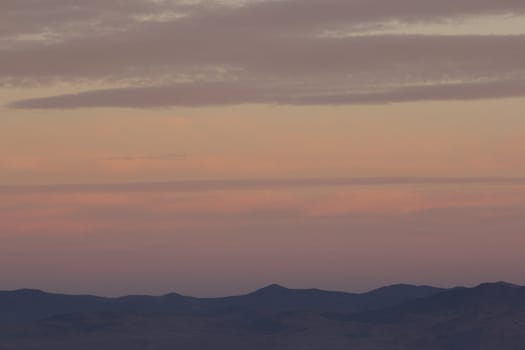 Mountain range and sky at dusk. excelletn for copyspace or backdrops.