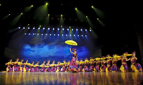 CHENGDU - SEP 26: chinese Yi ethnic dancers perform on stage at JIAOZI theater.Sep 26,2010 in Chengdu, China.