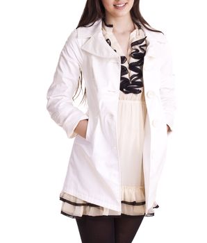 Young beautiful woman wearing white coat