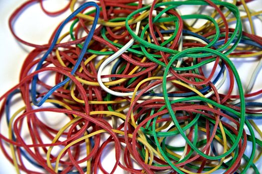 Set of multi-coloured elastic bands close up