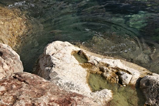 Stones under water close up on background