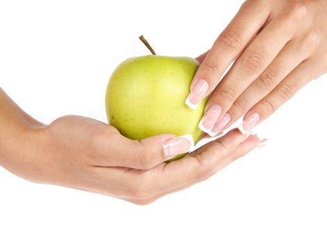 Hand with apple isolated on white