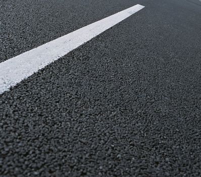 asfalt road close up isolated on grey background