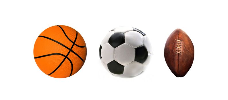 A group of sports balls on a white
