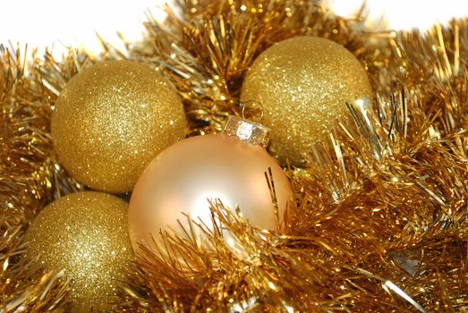 Gold metalicChristmas ornaments are home decoration.