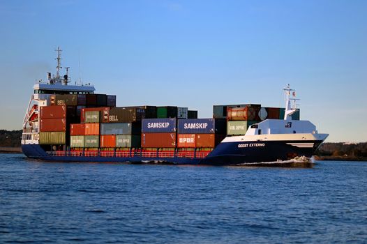 Containership going from Larvik, Norway. JR-Shipping,Geest-Externo,Harlingen,Netherland. Sailing under Dutch flag. Norway 2005.