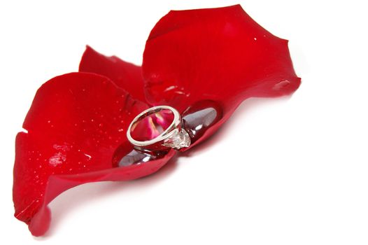 decoration from deep red rose petals with glass stones