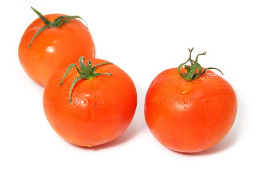 three rd ripe tomato isolated on white