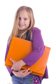 Girl with a bright orange folder and floral jeans