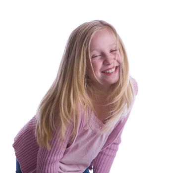 Girl laughing until turning red and leaning forward
