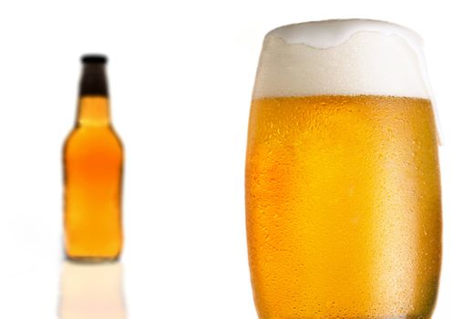 bottle and glass with beer on white background