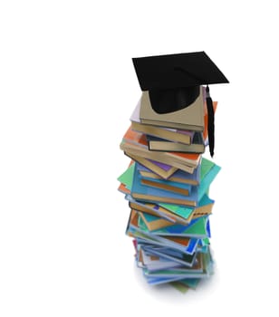 Student hat on books