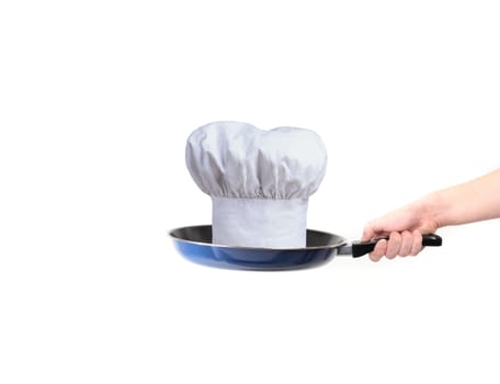 chef hat on pan - concept
