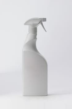 White spray bottle on a white background