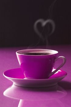 Purple Coffee cup with love isolated on purple and black