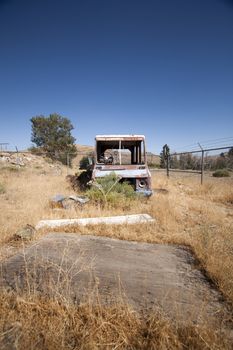 An old rusty abandoned car.