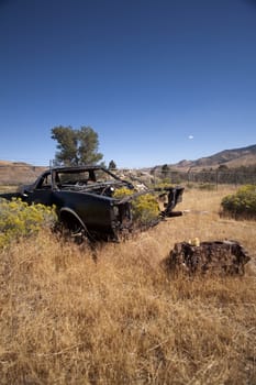 An old rusty abandoned car.