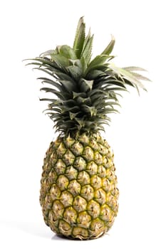 A whole pineapple isolated on a white background.